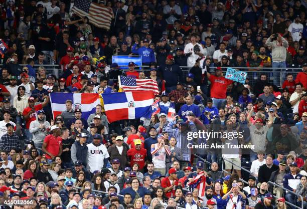 Fans cheer during Game 6 of Pool F of the 2017 World Baseball Classic between Team USA and Team Dominican Republic on Saturday, March 18, 2017 at...