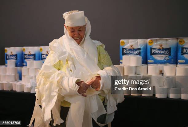 Heather Ellis applies the finishing touches to her costume at Powerhouse Museum on March 19, 2017 in Sydney, Australia. A total of XXX people wrapped...