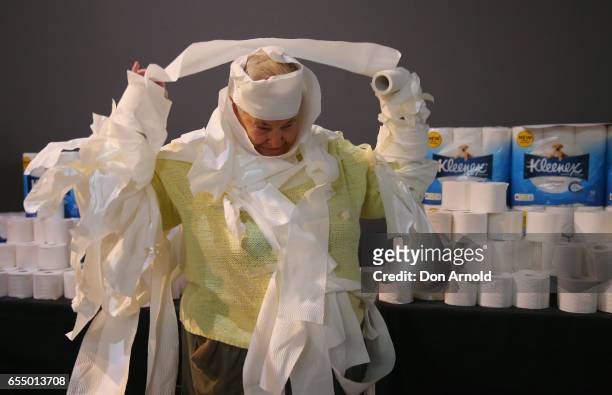 Heather Ellis applies the finishing touches to her costume at Powerhouse Museum on March 19, 2017 in Sydney, Australia. A total of XXX people wrapped...
