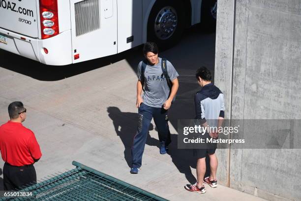 Infielder Hayato Sakamoto of Japan is seen on arrival at the stadium prior to the exhibition game between Japan and Chicago Cubs at Sloan Park on...