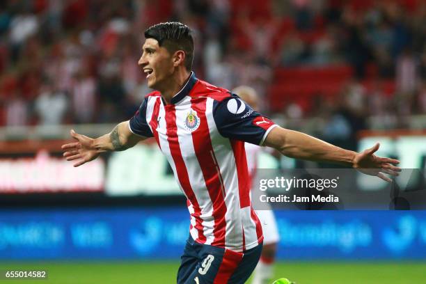 Alan Pulido of Chivas celebrates after scoring his team's first goal during the 11th round match between Chivas and Santos as part of the Torneo...