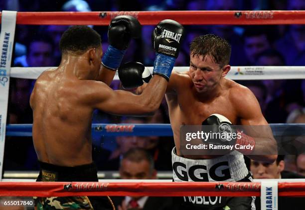 New York , United States - 18 March 2017; Gennady Golovkin, right, in action against Daniel Jacobs during their middleweight title bout at Madison...