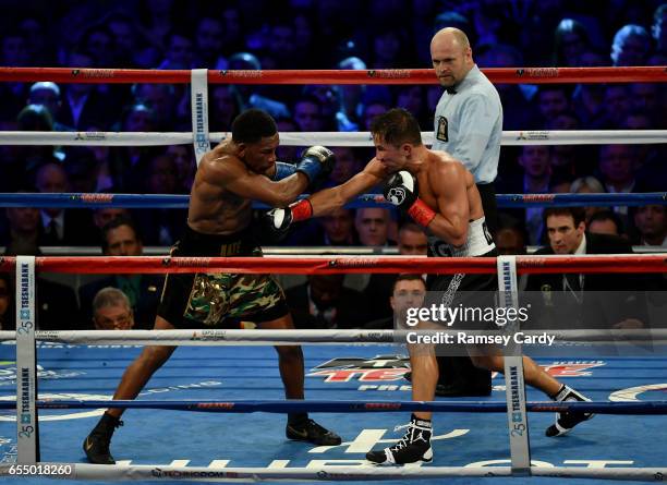 New York , United States - 18 March 2017; Gennady Golovkin, right, in action against Daniel Jacobs during their middleweight title bout at Madison...