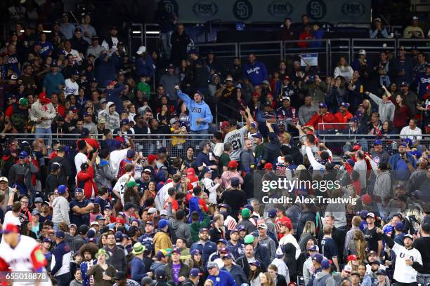 Fans cheer during Game 6 of Pool F of the 2017 World Baseball Classic between Team USA and Team Dominican Republic on Saturday, March 18, 2017 at...