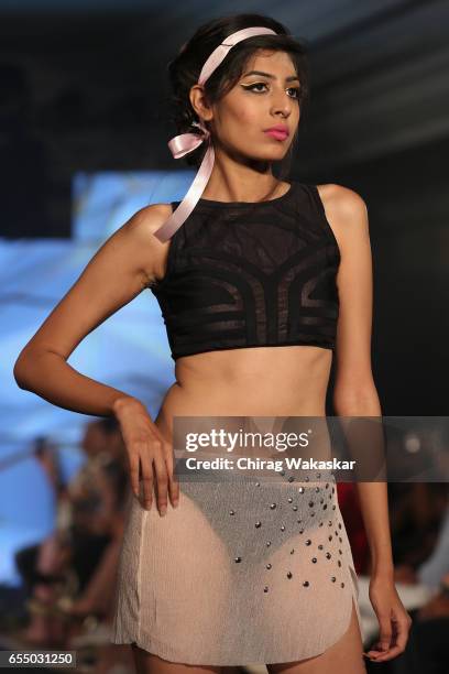 Model walks the runway at the Nidhi Munim show during India Intimate Fashion Week 2017 at Hotel Leela on March 18, 2017 in Mumbai, India.