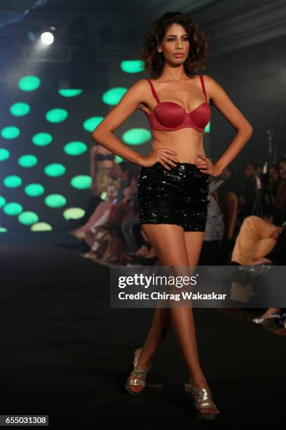 Model walks the runway at the Triumph International show during India Intimate Fashion Week 2017 at Hotel Leela on March 18, 2017 in Mumbai, India.