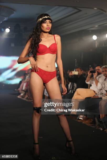 Model walks the runway at the Triumph International show during India Intimate Fashion Week 2017 at Hotel Leela on March 18, 2017 in Mumbai, India.