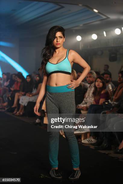 Model walks the runway at the Triumph International show during India Intimate Fashion Week 2017 at Hotel Leela on March 18, 2017 in Mumbai, India.