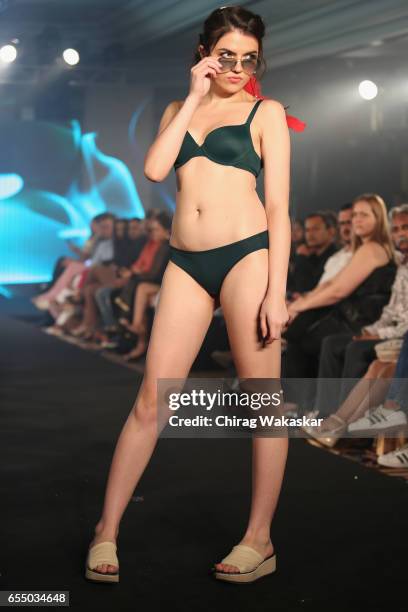 Model walks the runway at the Triumph International show during India Intimate Fashion Week 2017 at Hotel Leela on March 18, 2017 in Mumbai, India.