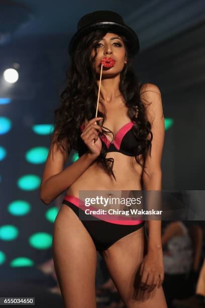 Model walks the runway at the Triumph International show during India Intimate Fashion Week 2017 at Hotel Leela on March 18, 2017 in Mumbai, India.