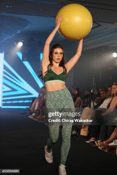 Model walks the runway at the Triumph International show during India Intimate Fashion Week 2017 at Hotel Leela on March 18, 2017 in Mumbai, India.