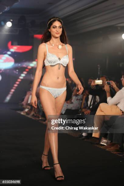 Model walks the runway at the Triumph International show during India Intimate Fashion Week 2017 at Hotel Leela on March 18, 2017 in Mumbai, India.