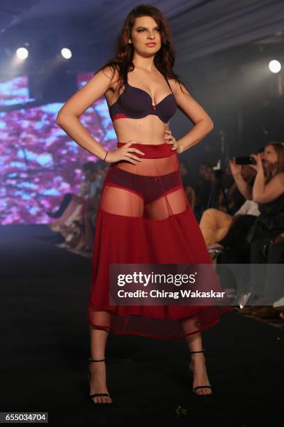 Model walks the runway at the Triumph International show during India Intimate Fashion Week 2017 at Hotel Leela on March 18, 2017 in Mumbai, India.