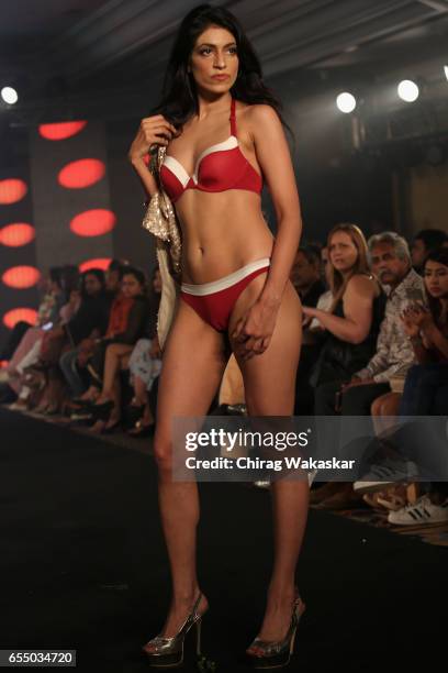 Model walks the runway at the Triumph International show during India Intimate Fashion Week 2017 at Hotel Leela on March 18, 2017 in Mumbai, India.