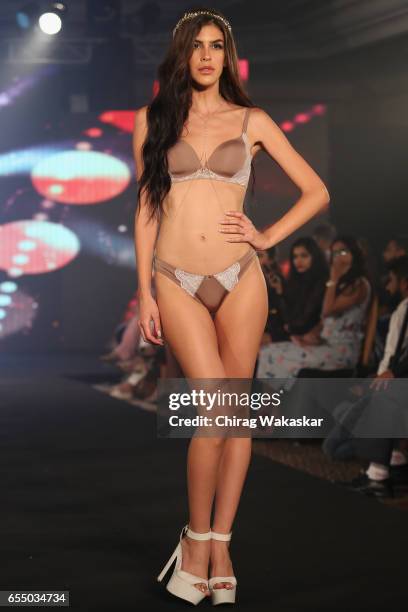 Model walks the runway at the Triumph International show during India Intimate Fashion Week 2017 at Hotel Leela on March 18, 2017 in Mumbai, India.