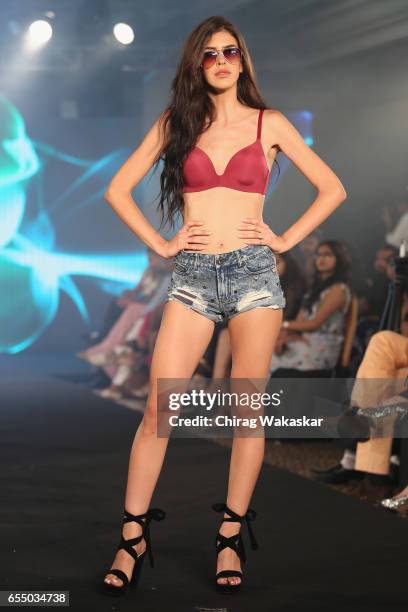 Model walks the runway at the Triumph International show during India Intimate Fashion Week 2017 at Hotel Leela on March 18, 2017 in Mumbai, India.