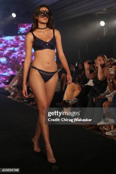 Model walks the runway at the Triumph International show during India Intimate Fashion Week 2017 at Hotel Leela on March 18, 2017 in Mumbai, India.