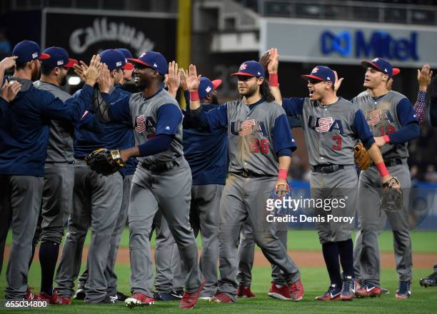United States players celebrate after beating the Dominican Republic 6-3 in World Baseball Classic Pool F Game Six at PETCO Park on March 18, 2017 in...