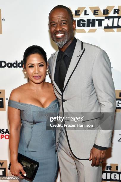 Singer/songwriter Brian McKnight and Leilani Mendoza attend Muhammad Ali's Celebrity Fight Night XXIII at the JW Marriott Desert Ridge Resort & Spa...