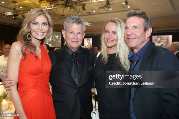 Actress Shawn King, record producer David Foster, Santa Auzina and actor Dennis Quaid attend Muhammad Ali's Celebrity Fight Night XXIII at the JW...