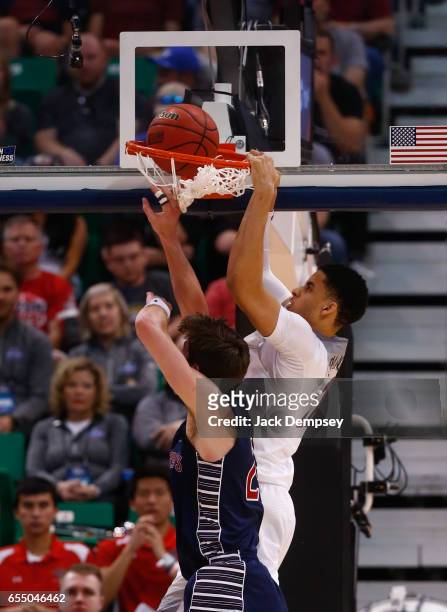 Chance Comanche of Arizona attempts to dunk the ball over Dane Pineau of St. Mary's during the 2017 NCAA Photos via Getty Images Men's Basketball...