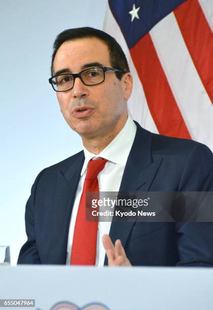 Treasury Secretary Steven Mnuchin speaks at a news conference in Baden-Baden, Germany, on March 18 after the end of a meeting of the Group of 20...