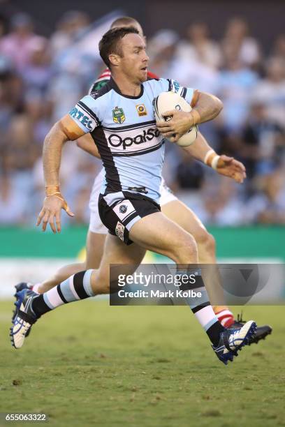 James Maloney of the Sharks runs the ball during the round three NRL match between the Cronulla Sharks and the St George Illawarra Dragons at...