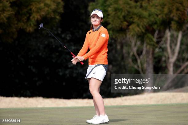 Ayaka Watanabe of Japan reacts after a putt on the 16th green during the T-Point Ladies Golf Tournament at the Wakagi Golf Club on March 19, 2017 in...