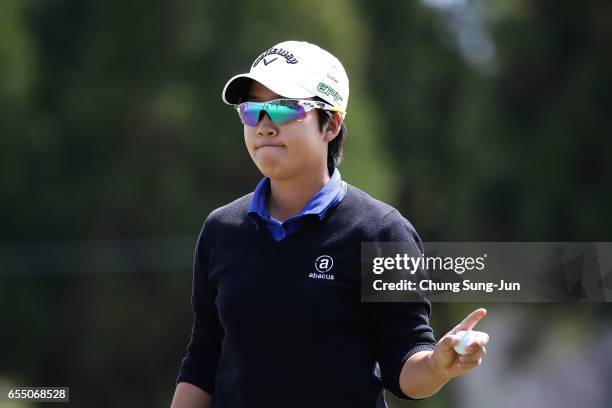 Hee-Kyung Bae of South Korea reacts after a putt on the 7th green during the T-Point Ladies Golf Tournament at the Wakagi Golf Club on March 19, 2017...