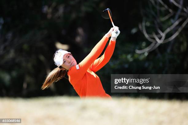 Ayaka Watanabe of Japan plays a tee shot on the 8th hole during the T-Point Ladies Golf Tournament at the Wakagi Golf Club on March 19, 2017 in Aira,...