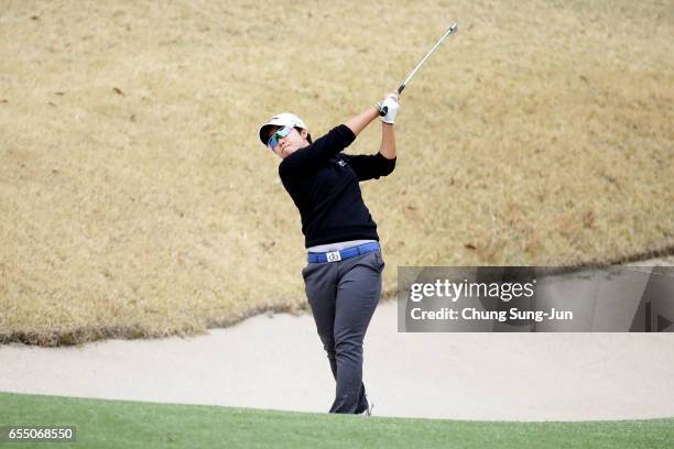 Hee-Kyung Bae of South Korea plays a shot on the 5th hole during the T-Point Ladies Golf Tournament at the Wakagi Golf Club on March 19, 2017 in...