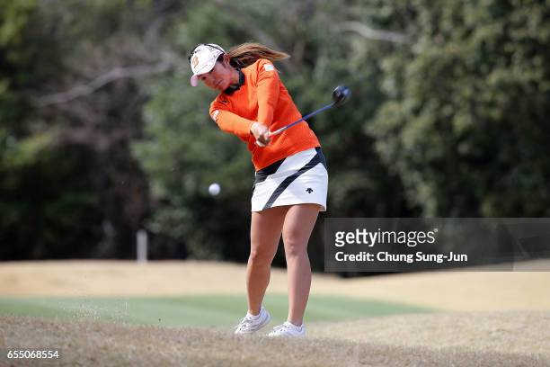 Ayaka Watanabe of Japan plays a shot on the 16th green during the T-Point Ladies Golf Tournament at the Wakagi Golf Club on March 19, 2017 in Aira,...