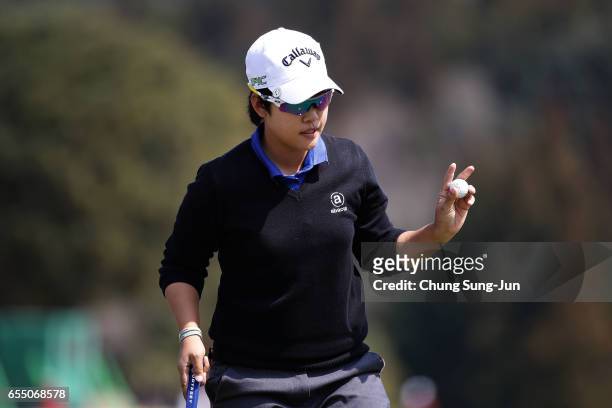 Hee-Kyung Bae of South Korea reacts after a putt on the 9th green during the T-Point Ladies Golf Tournament at the Wakagi Golf Club on March 19, 2017...
