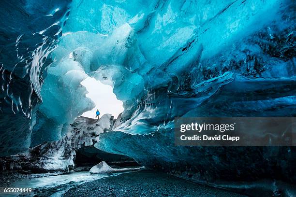 ice caves in the vatnajokull glacier in iceland - larger than life stock-fotos und bilder