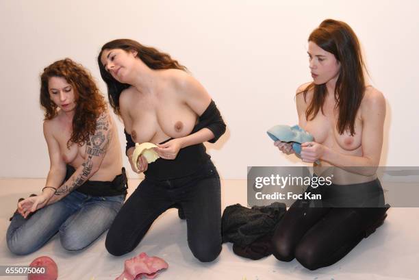 Visual artists Camille Moravi, Sarah Trouche and actress/model Zoe Duchesne during the 'Faccia A Faccia' Sarah Trouche performance exhibition at...