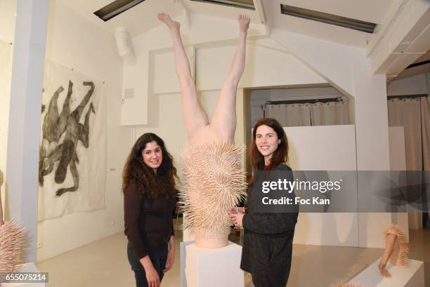 Actress /model Zoe Duchesne and visual artist Sarah Trouche during the 'Faccia A Faccia' Sarah Trouche performance exhibition at Galerie Vanessa...