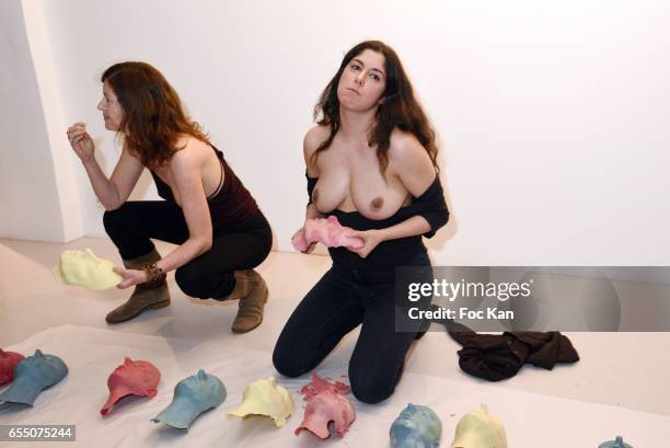 Visual artists June McGrane and Sarah Trouche during the 'Faccia A Faccia' Sarah Trouche performance exhibition at Galerie Vanessa Quang on March 18,...