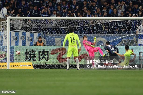 Yasuyuki Konno of Gamba Osaka heads the ball to score the opening goal during the J.League J1 match between Gamba Osaka and Urawa Red Diamonds at...