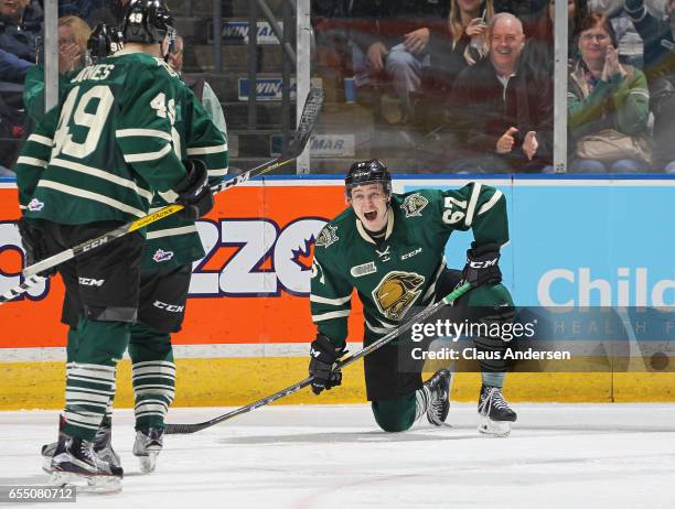 Mitchell Stephens of the London Knights cannot believe the highlight reel goal teammate Max Jones has scored against the Flint Firebirds during an...