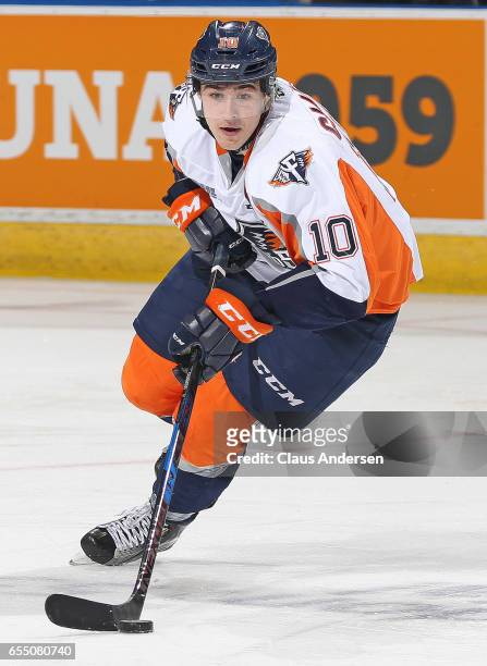 Nicholas Caamano of the Flint Firebirds skates with the puck against the London Knights during an OHL game at Budweiser Gardens on March 17, 2017 in...