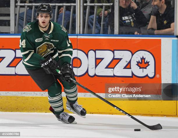 Brandon Crawley of the London Knights skates with the puck against the Flint Firebirds during an OHL game at Budweiser Gardens on March 17, 2017 in...
