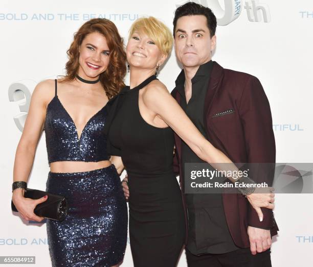 Actors Courtney Hope, Schae Harrison, and Mick Cain attend CBS's "The Bold and The Beautiful" 30th Anniversary Party at Clifton's Cafeteria on March...