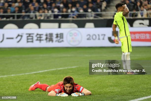 Ken Tajiri of Gamba Osaka shows dejection after Rafael Silva of Urawa Red Diamonds scores his side's first goal during the J.League J1 match between...