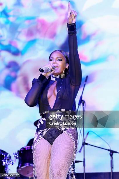 American singer Ashanti performs at afterparty of presentation BraVo international music awards at the 'Mir' Banquet room on March 18, 2017 in...