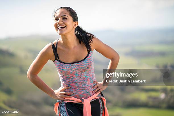 woman recovering during run - woman in spaghetti straps stock pictures, royalty-free photos & images