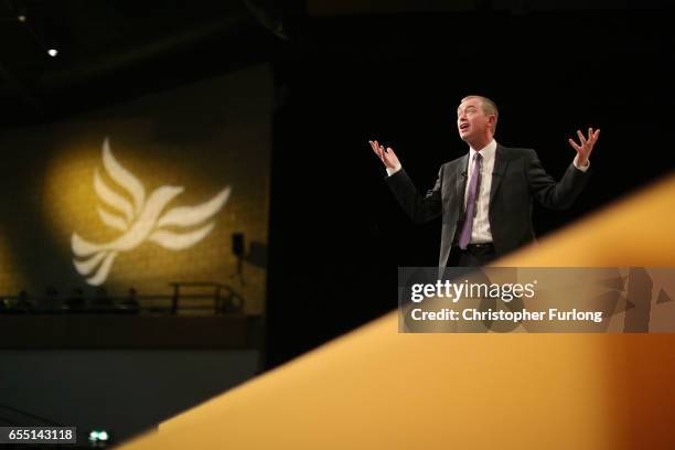 Liberal Democrats party leader Tim Farron delivers his keynote speech to party members on the last day of the Liberal Democrats spring conference at...