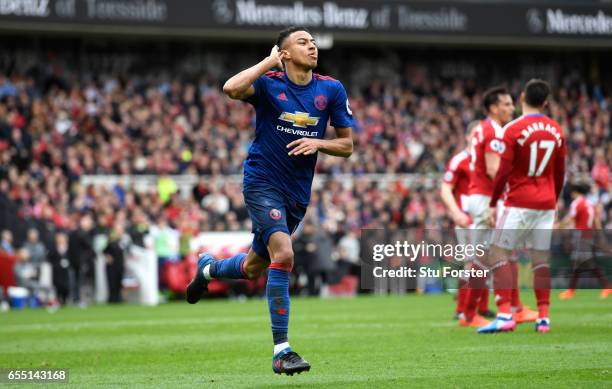 Jesse Lingard of Manchester United celebrates scoring his sides second goal during the Premier League match between Middlesbrough and Manchester...
