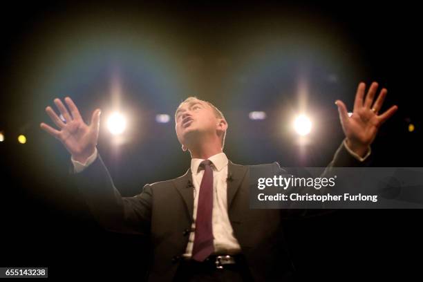 Liberal Democrats party leader Tim Farron delivers his keynote speech to party members on the last day of the Liberal Democrats spring conference at...