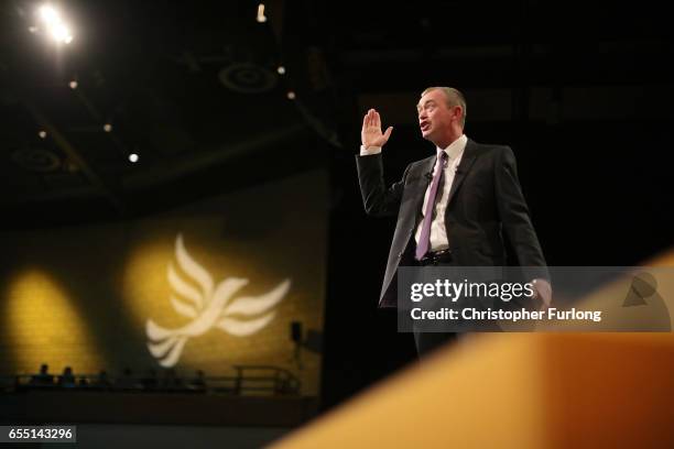 Liberal Democrats party leader Tim Farron delivers his keynote speech to party members on the last day of the Liberal Democrats spring conference at...