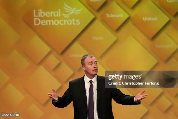 Liberal Democrats party leader Tim Farron delivers his keynote speech to party members on the last day of the Liberal Democrats spring conference at...